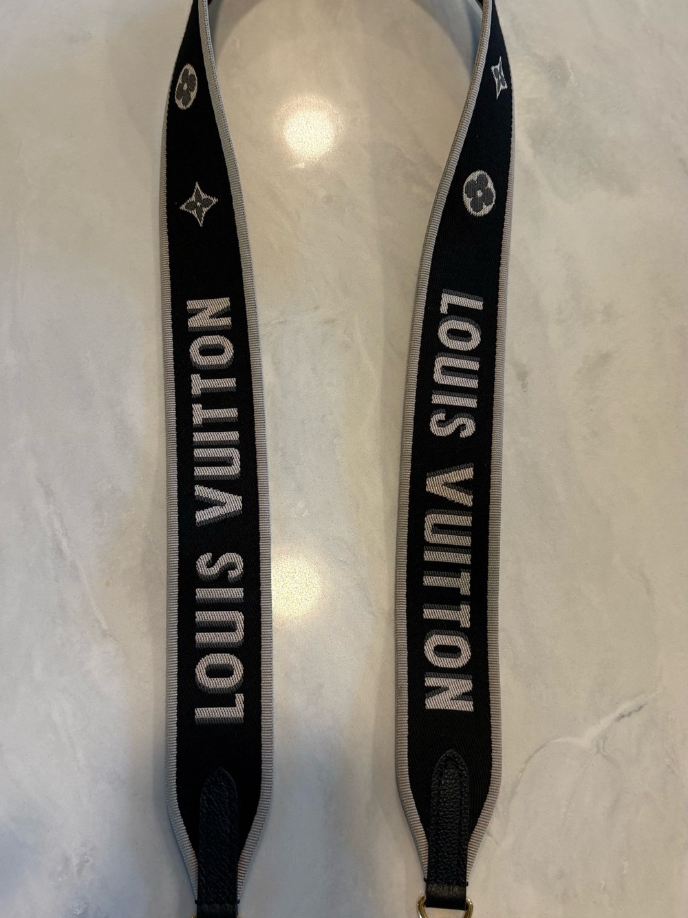 Authentic Louis Vuitton Black Strap with Gold Hardware